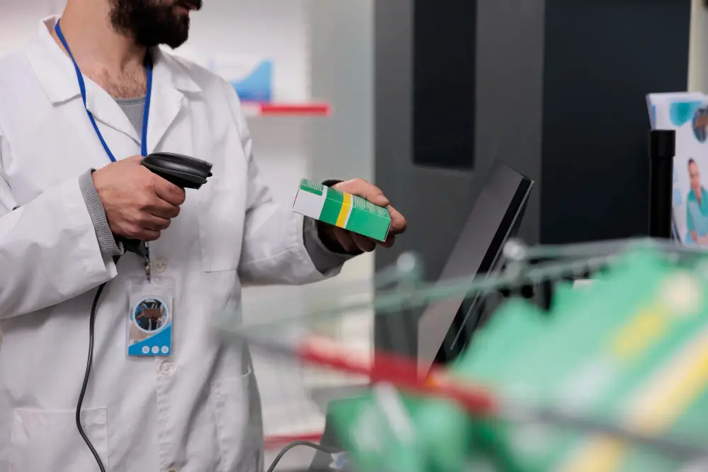 Hospital security officer checking a locked controlled drugs cabinet on a ward